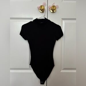 Black, ribbed, lettuce cut, bodysuit, Forever 21.